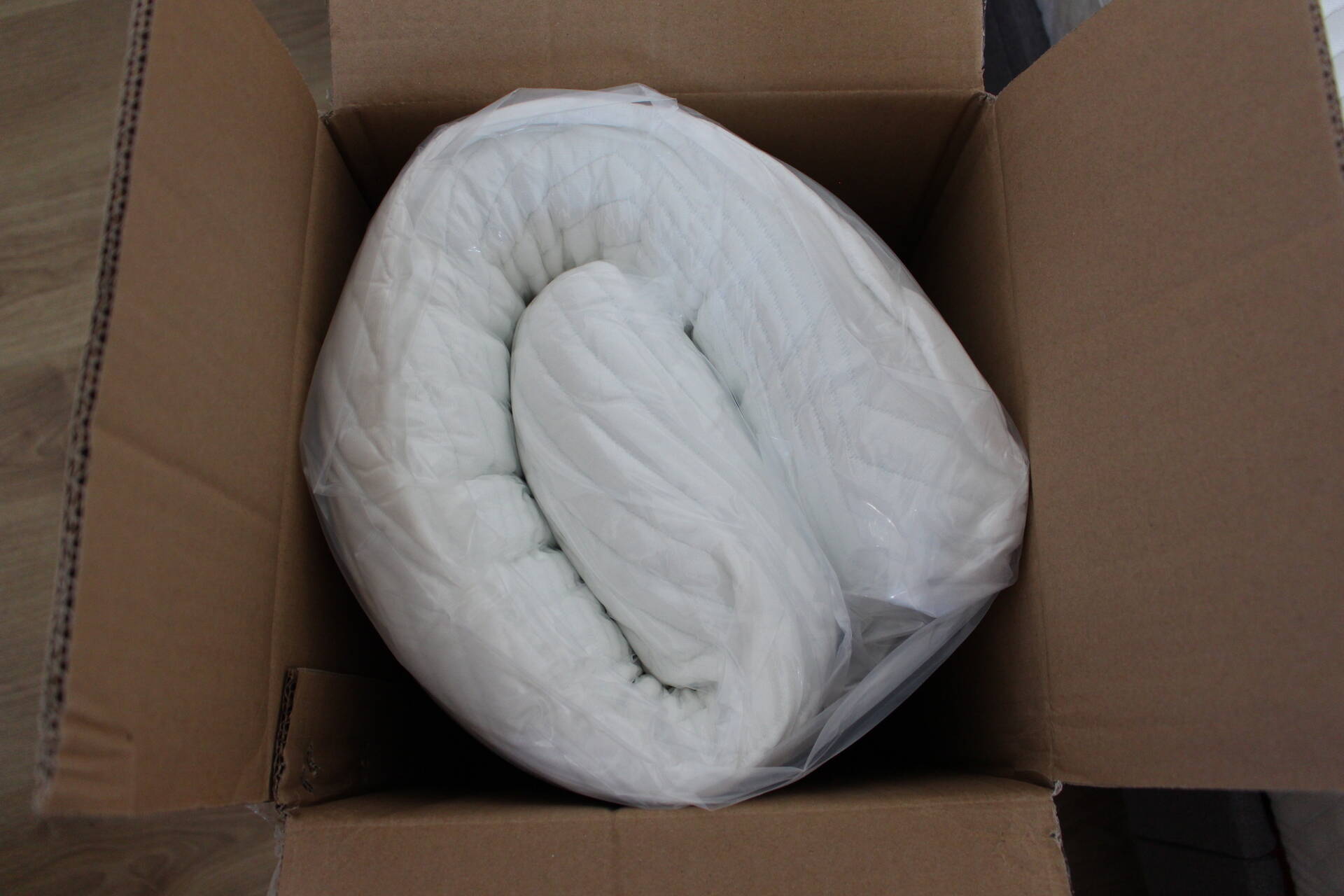 Topper gerollt in Box
